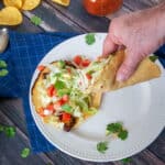 A set of tacos on homemade tortillas.