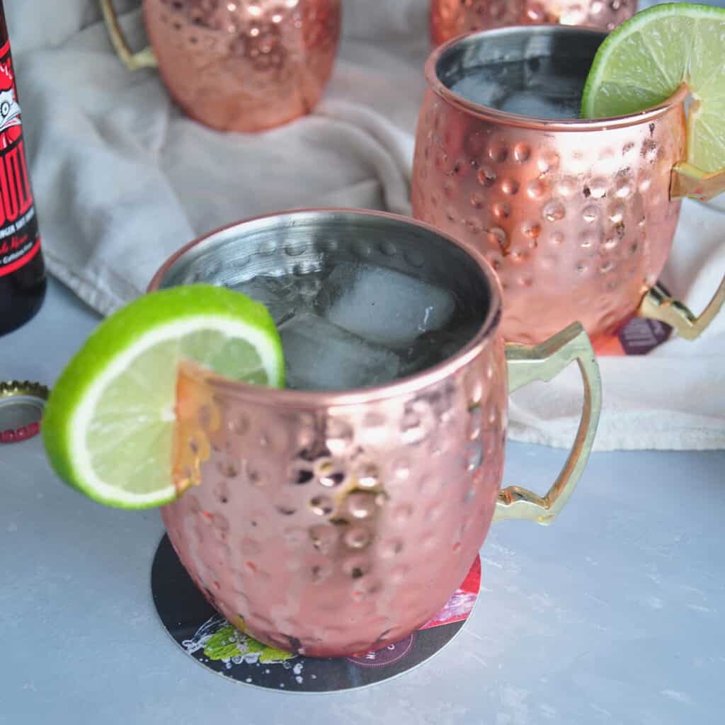 Perfect Moscow Mule recipe in a copper mug with a lime