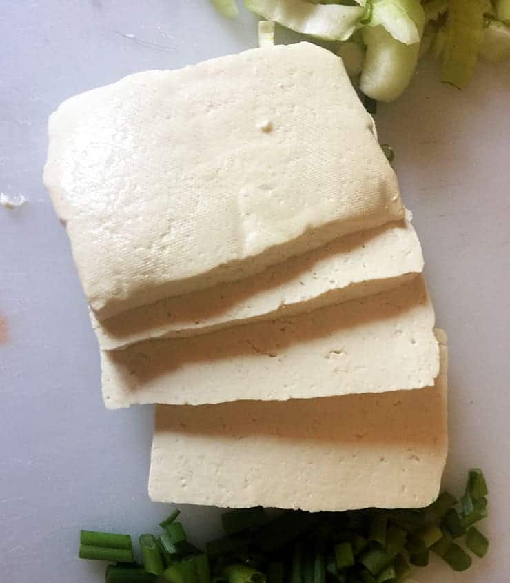 How to cut the tofu so that it works as intended by the recipe. This is one block of extra firm tofu cut into four pieces.