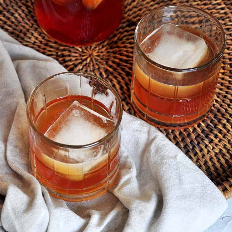 Apple Brandy Recipe on a platter with a with a white cloth underneat