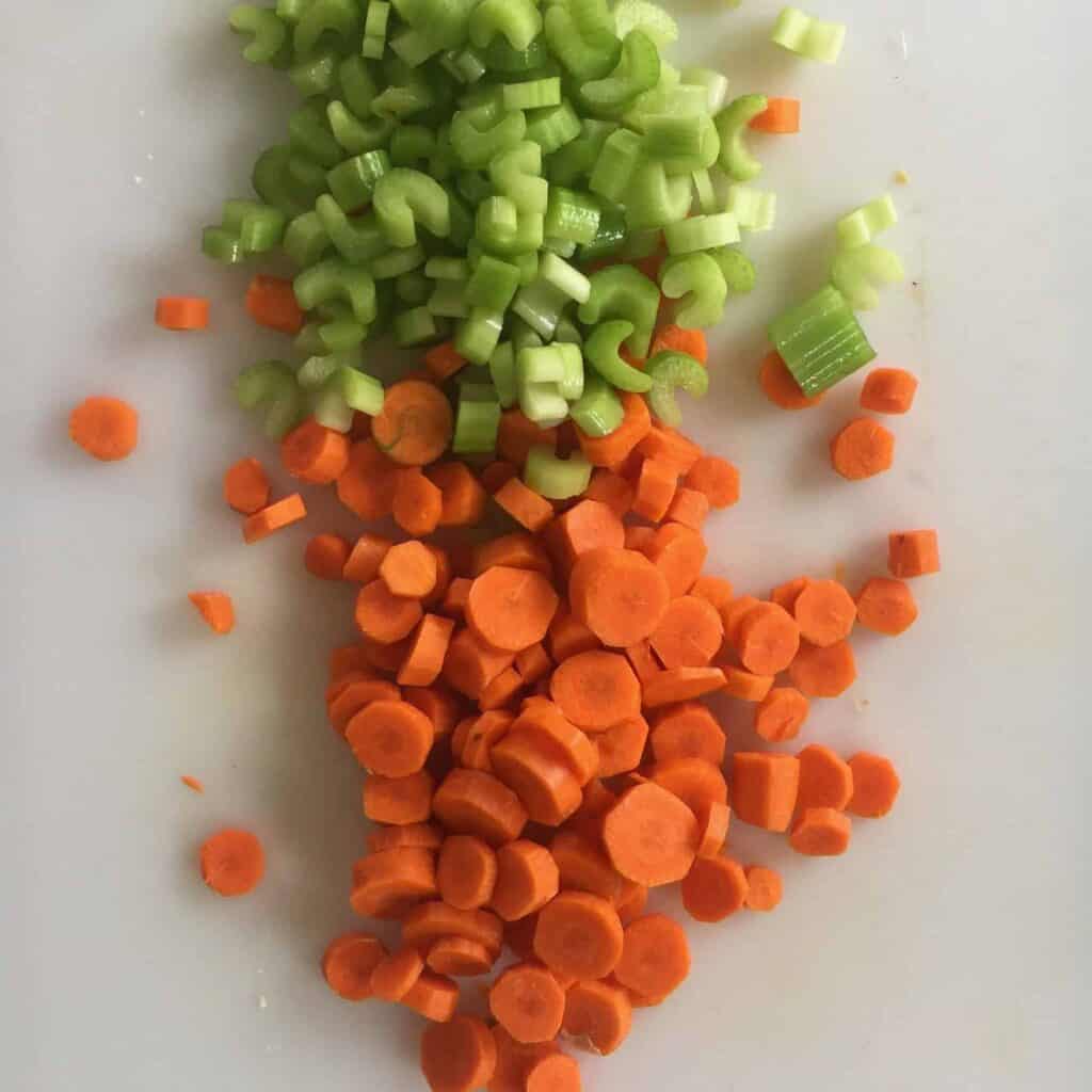 Carrots and celery on a cutting board