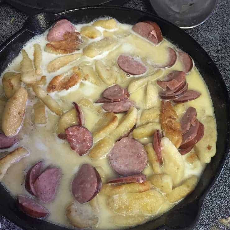 All knopfle sauerkraut ingredients are in the pan.