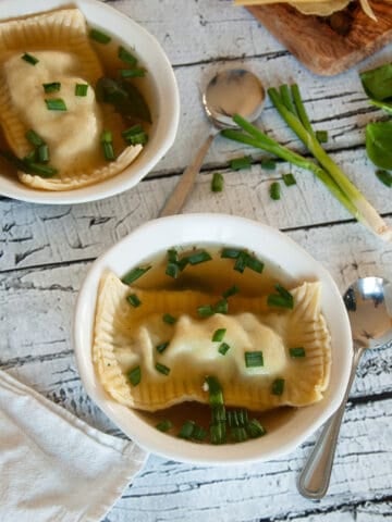 Maultaschen in two bowls of soup.