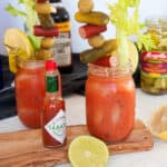 Two Bloody Mary recipe cocktails with all of the fixings