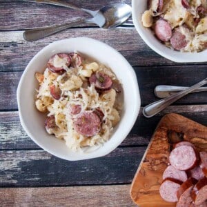 Sauerkraut, smoked sausage, and knoephla dumplings in a bowl.