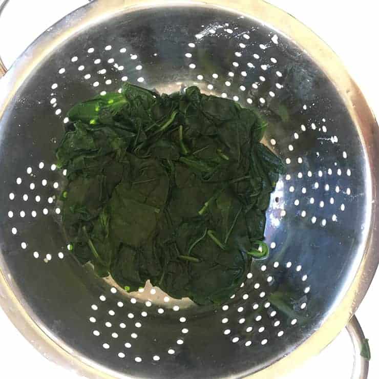 spinach in colander