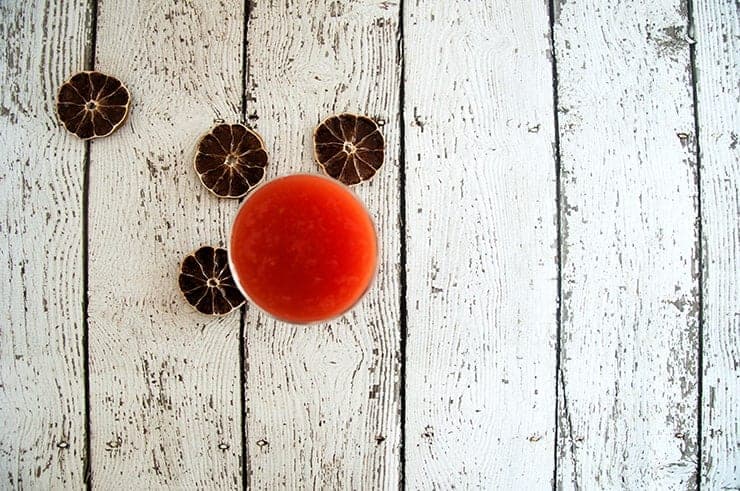 Overhead shot of tomato juice.