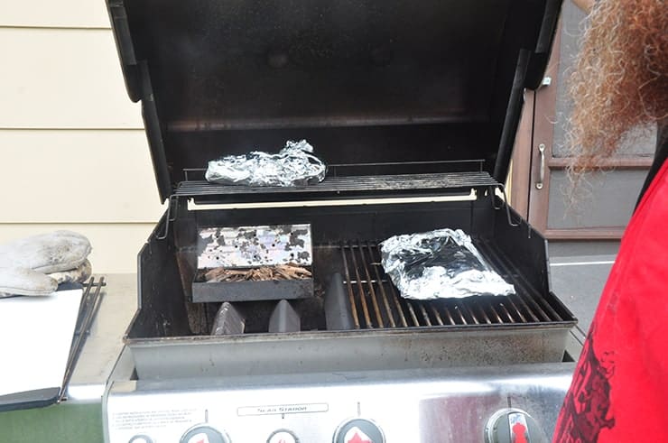 Foil Packet on an open Weber Grill.