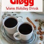 Traditional Norwegian Glogg - Warm Holiday Drink with two mugs of the stuff.