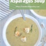 Creamy Asparagus Soup in a white bowl.