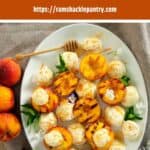 Grilled Peaches and Honey Whipped Mascarpone Cheese on a white plate.