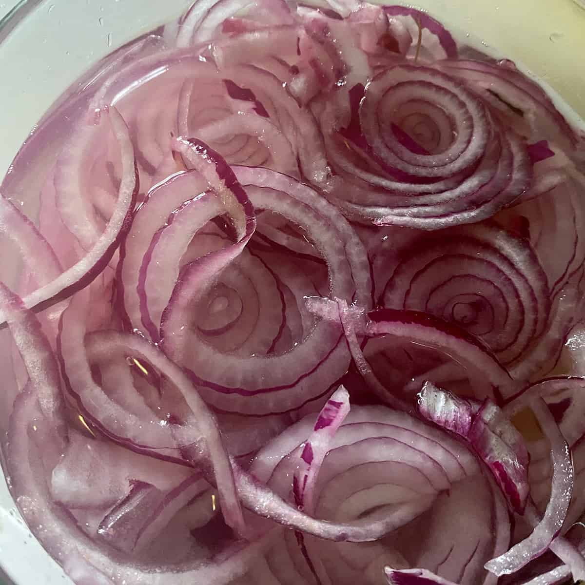 Red Onions soaking in salted water.