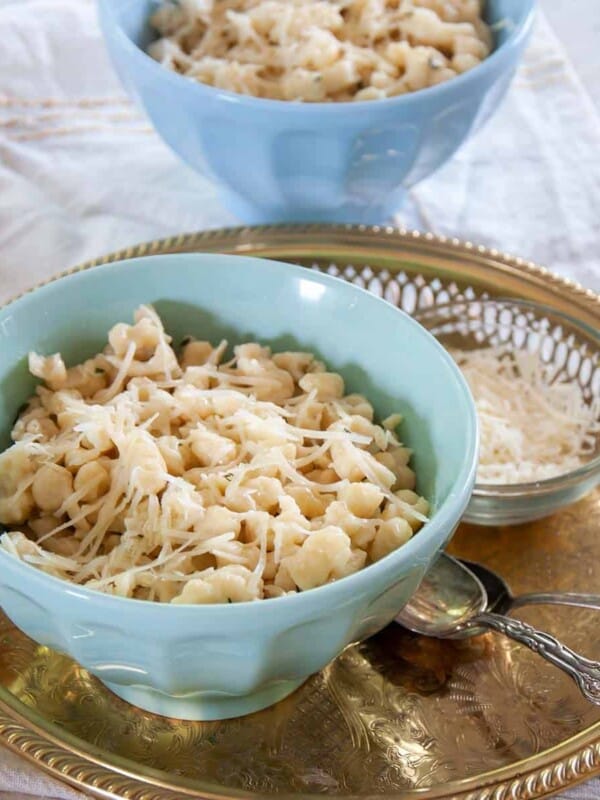 Bowl of Spaetzle with parmesan cheese on top.