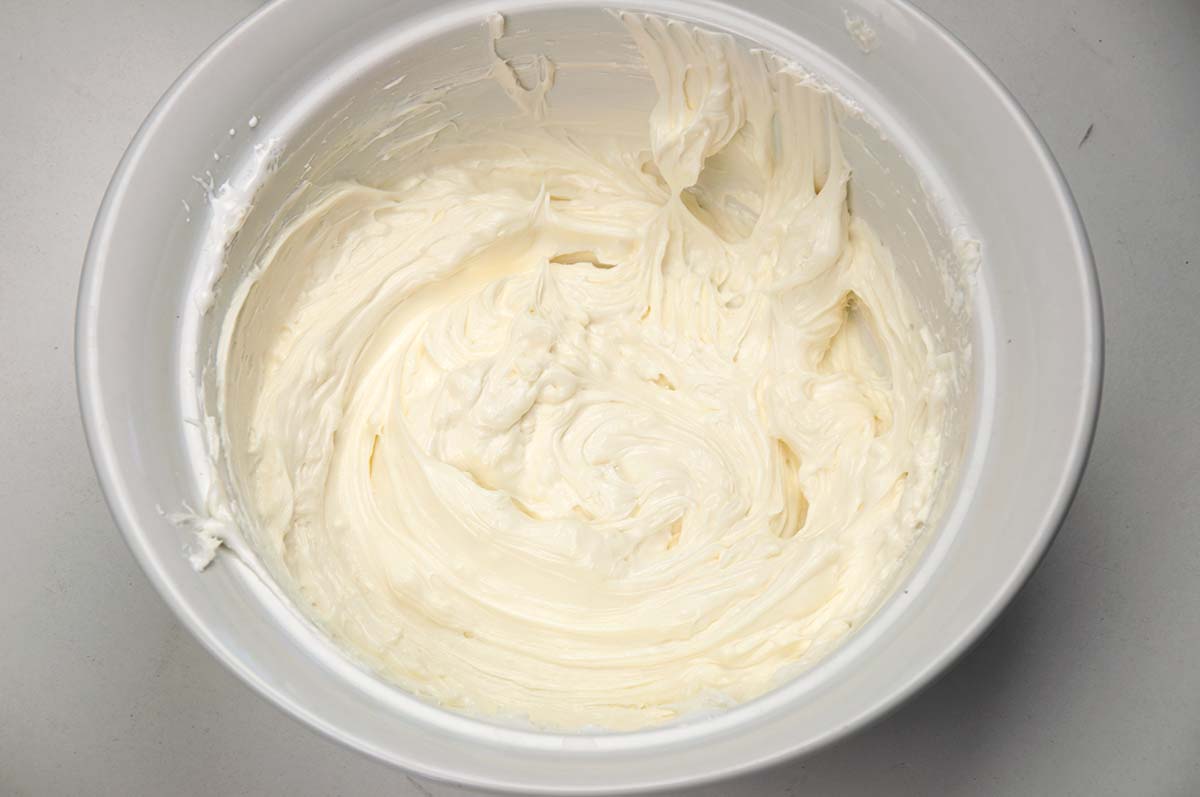 Mixture of Marshmallow Cream and softened cream cheese.