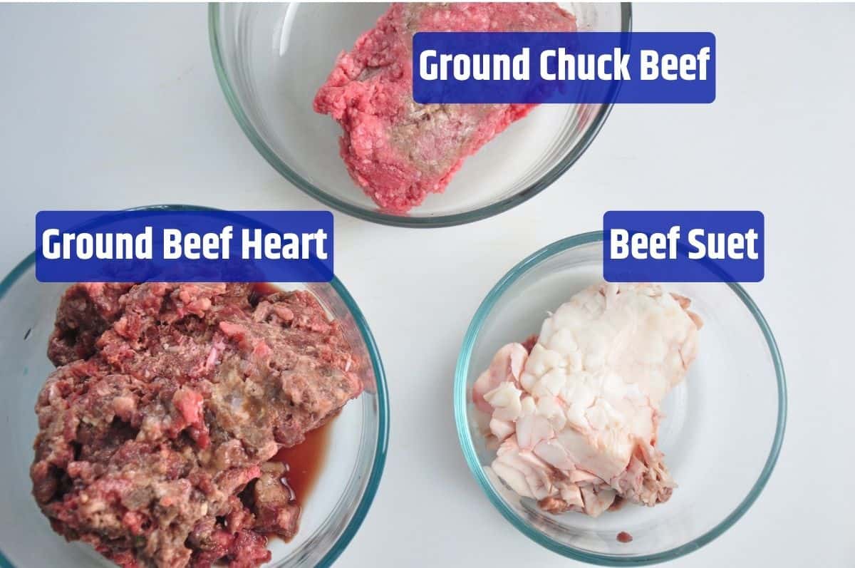 Ground Chuck, beef heart, and beef suet in glass bowls.