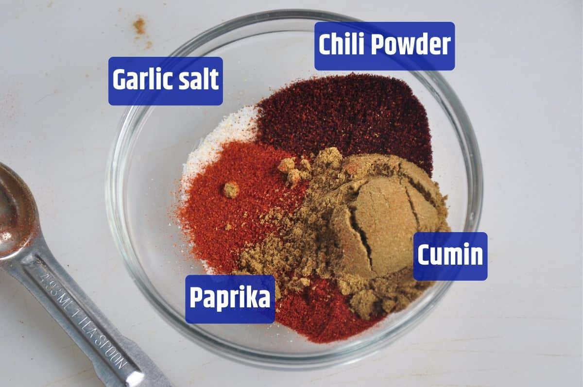 Garlic salt, paprika, cumin, and chili powder.