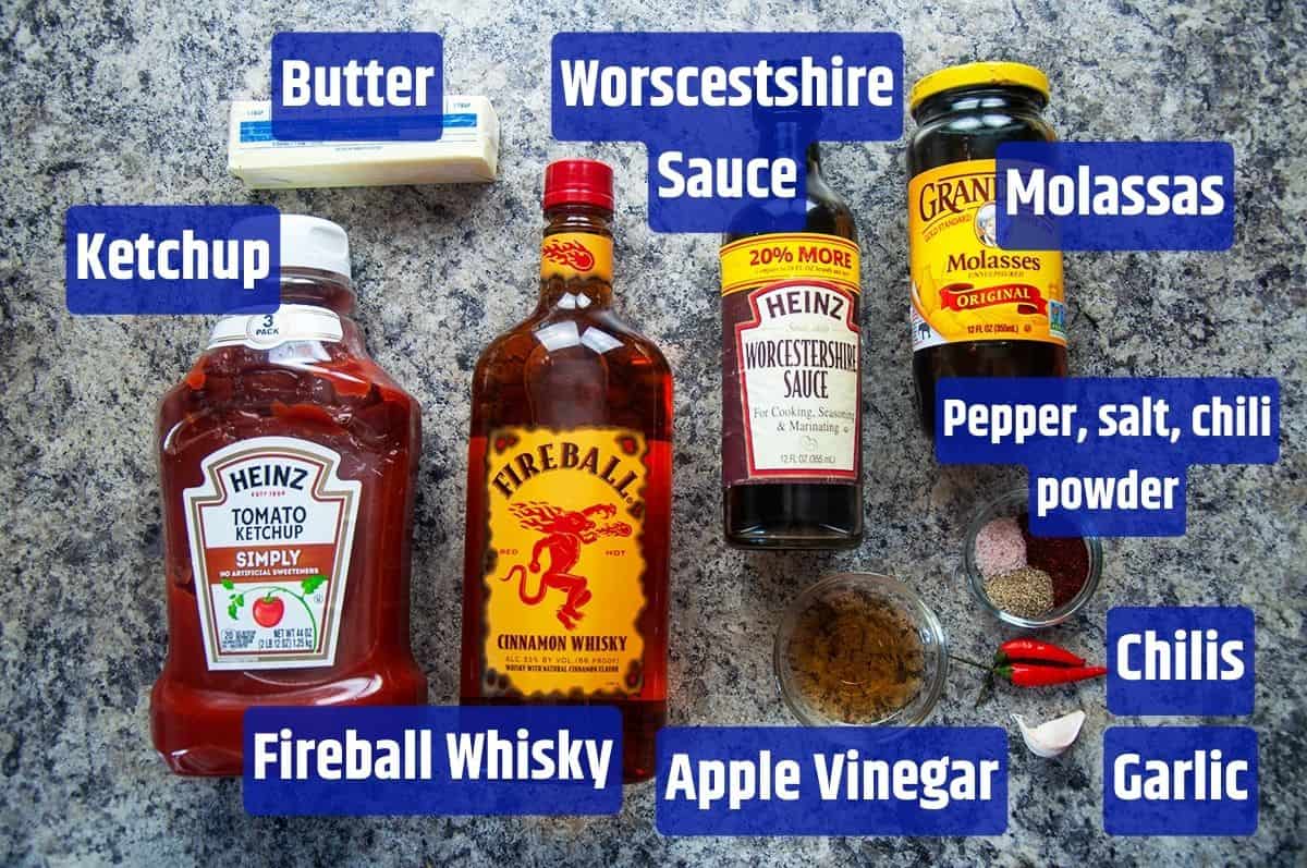 Fireball Whisky Spicy Barbeque Sauce ingredients on a table.