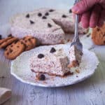 One slice of semifreddo ice cream cake on a white plate.