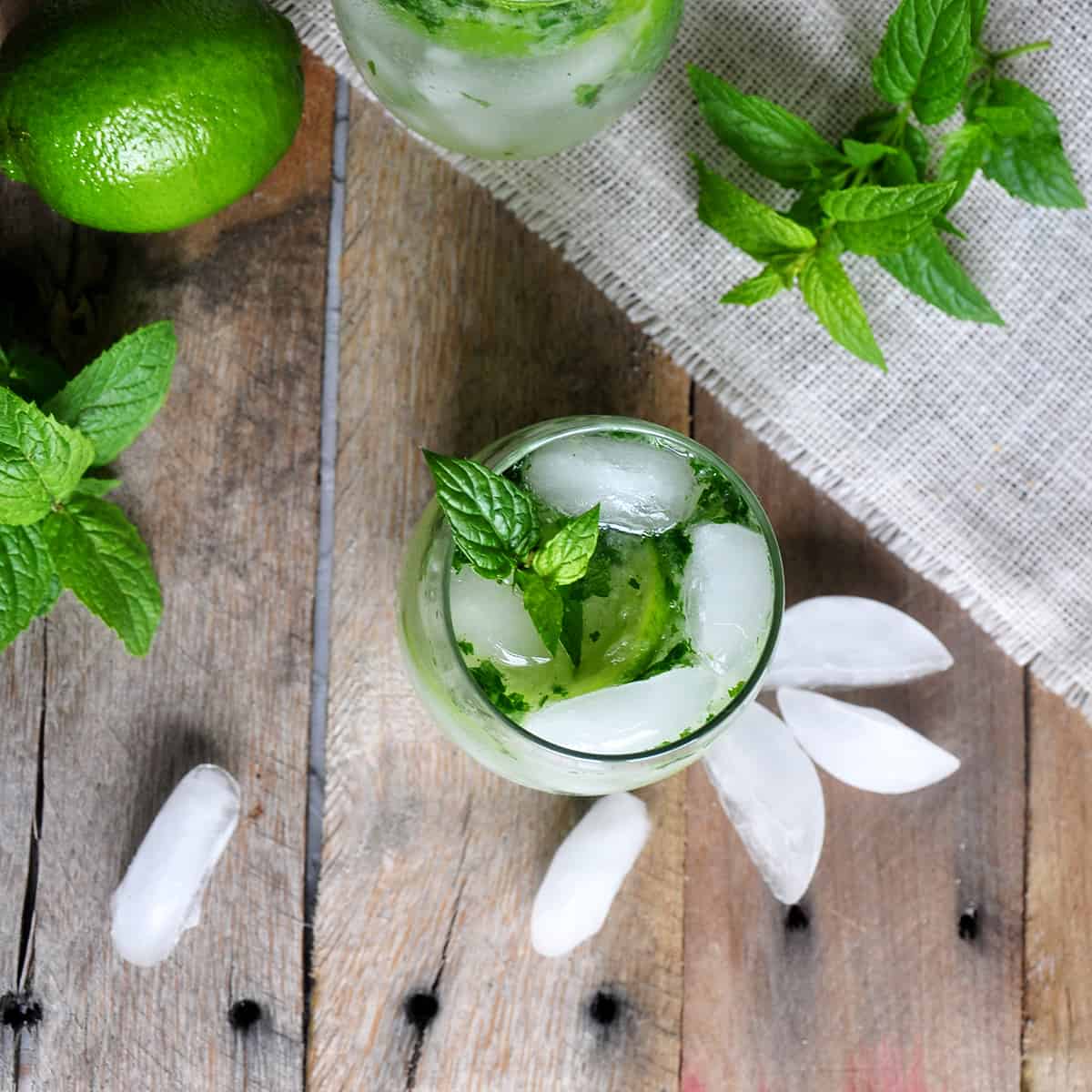 Mojito cocktail on a picnic table.