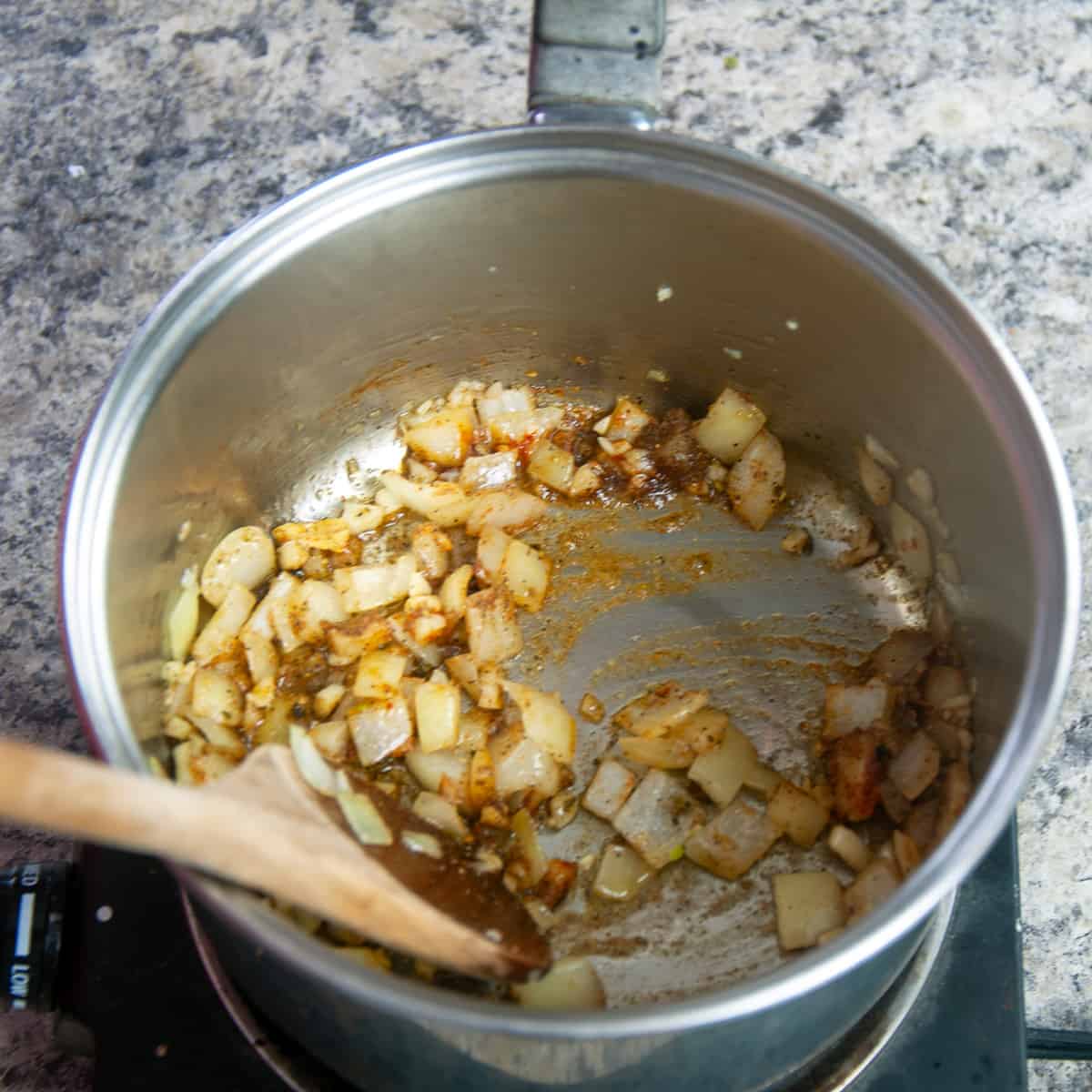 Softened onion and garlic with seasonings mixed in