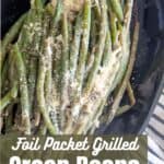 Foil Packet Grilled Green Beans on a dark plate.