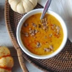 A single bowl of Spicy Pumpkin soup with Italian Sausage and Graham Masala.