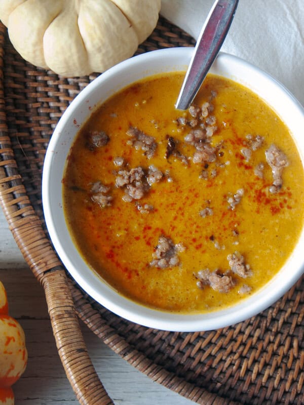 A single bowl of Spicy Pumpkin soup with Italian Sausage and Graham Masala.