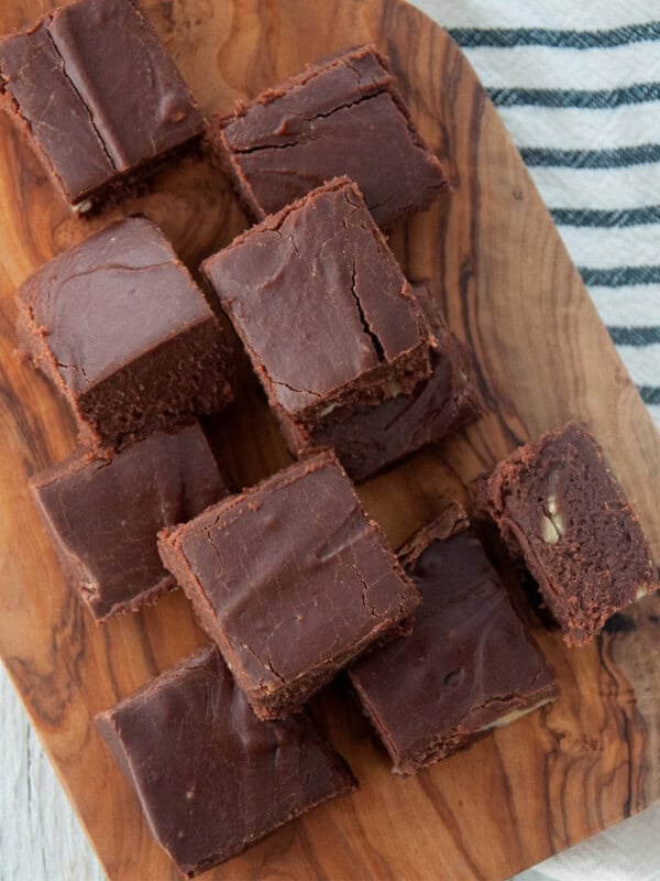 Several pieces of Velveeta fudge on a cutting board.